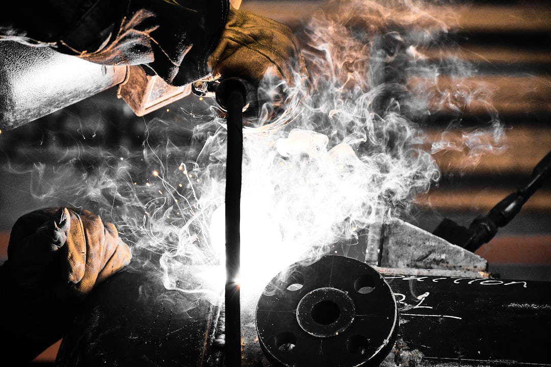 A welder working on a piece of metal