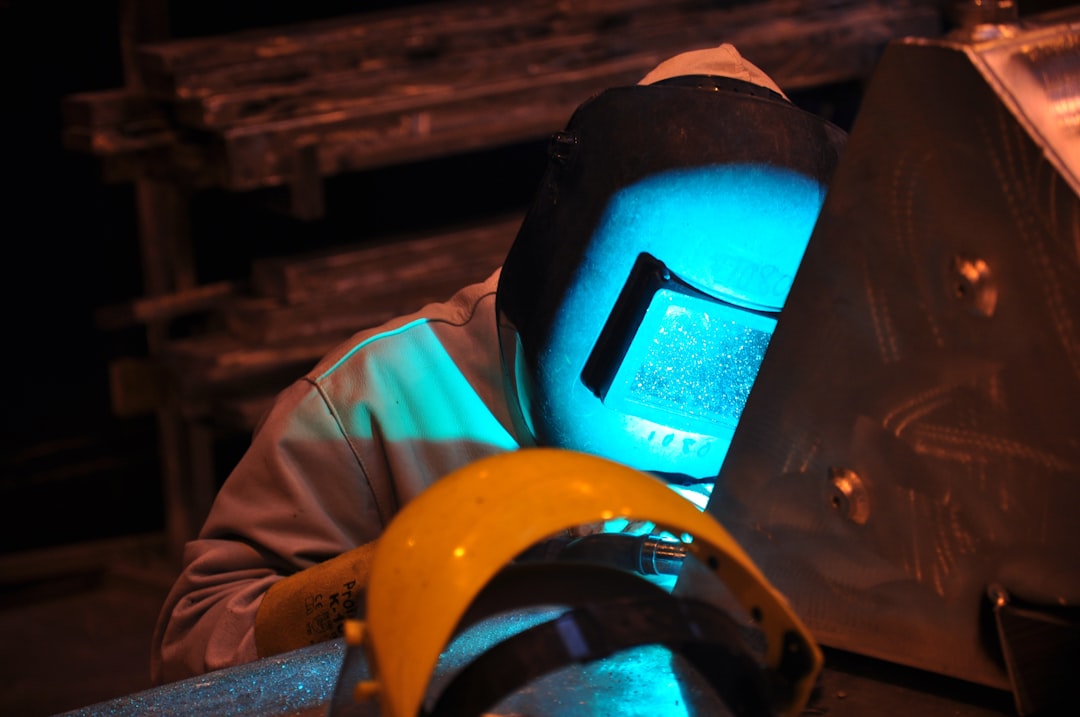 person wearing blue and black helmet